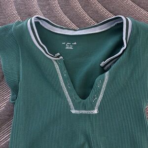 black and green urban top